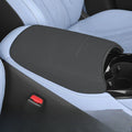 Black arm rest cover on light blue car seat for added protection and comfort